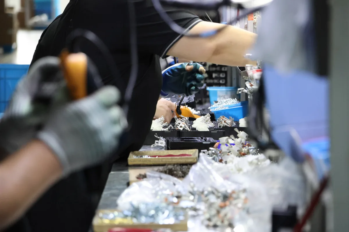 Circuit breaker and micro switch production floor in Yueqing, China — electrical components supply chain